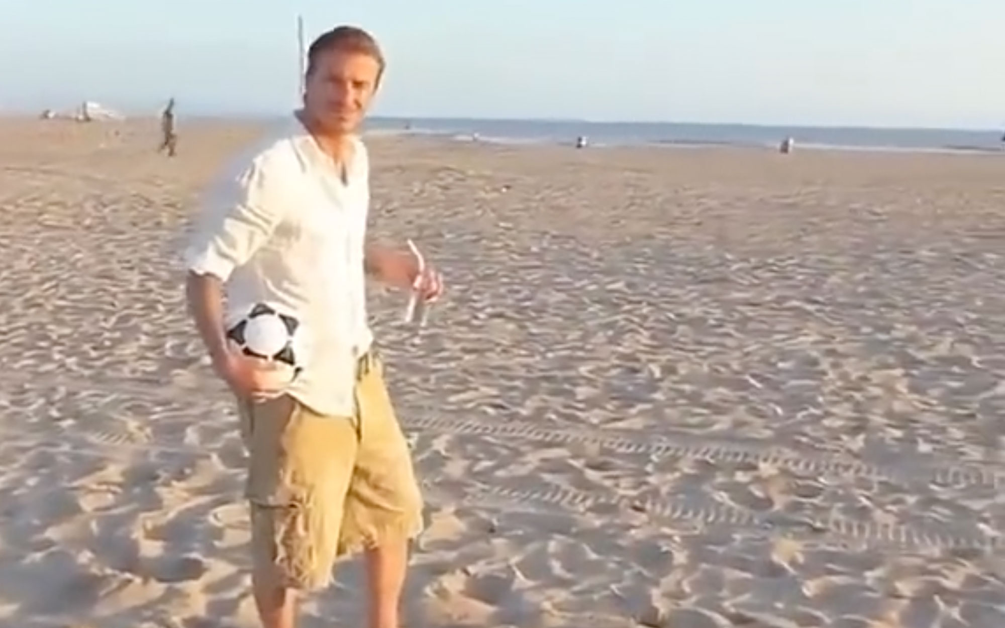David Beckham's drops three soccer balls into three separate trash cans like a boss