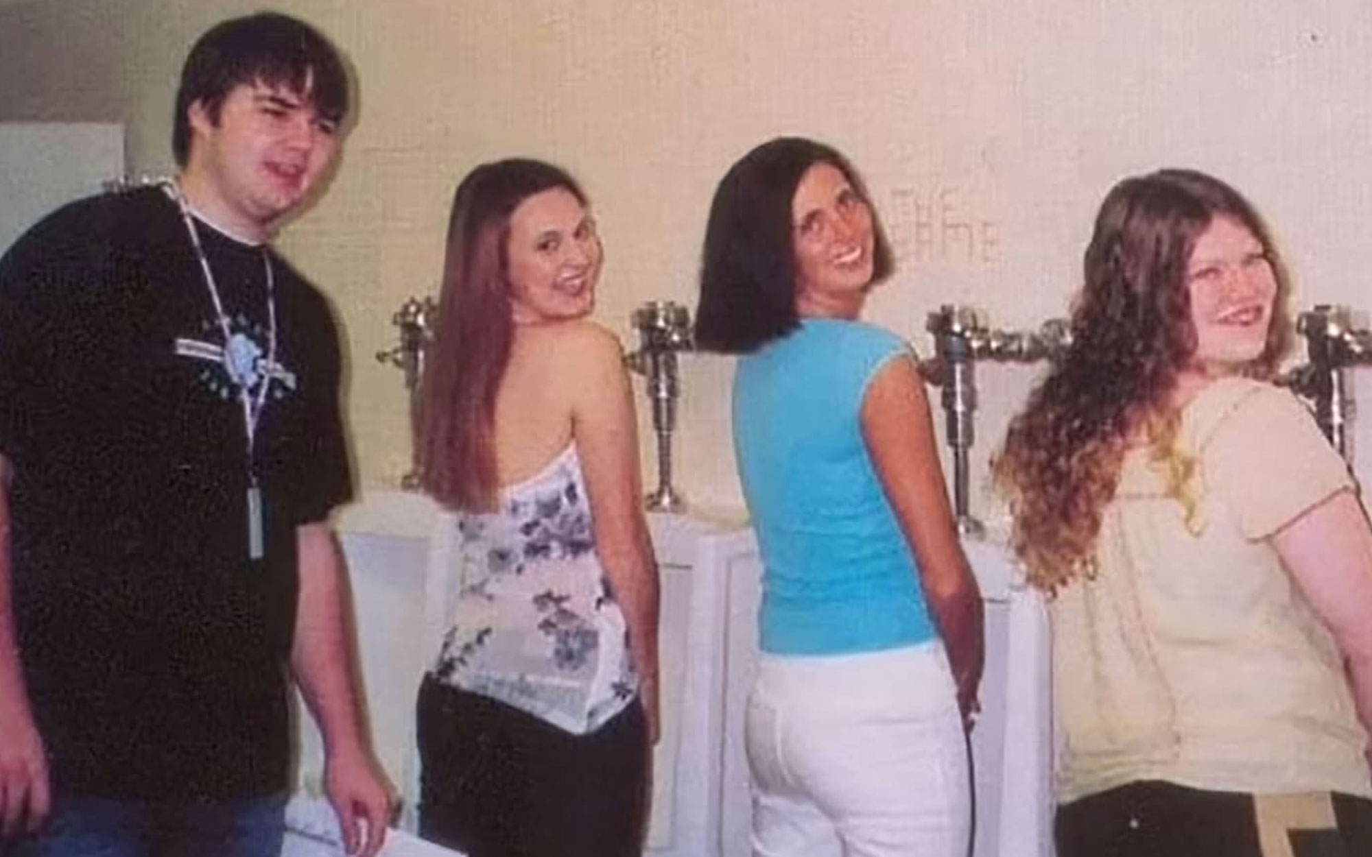 Newly unearthed photo shows teen JD Vance posing in bathroom with three girls at urinals