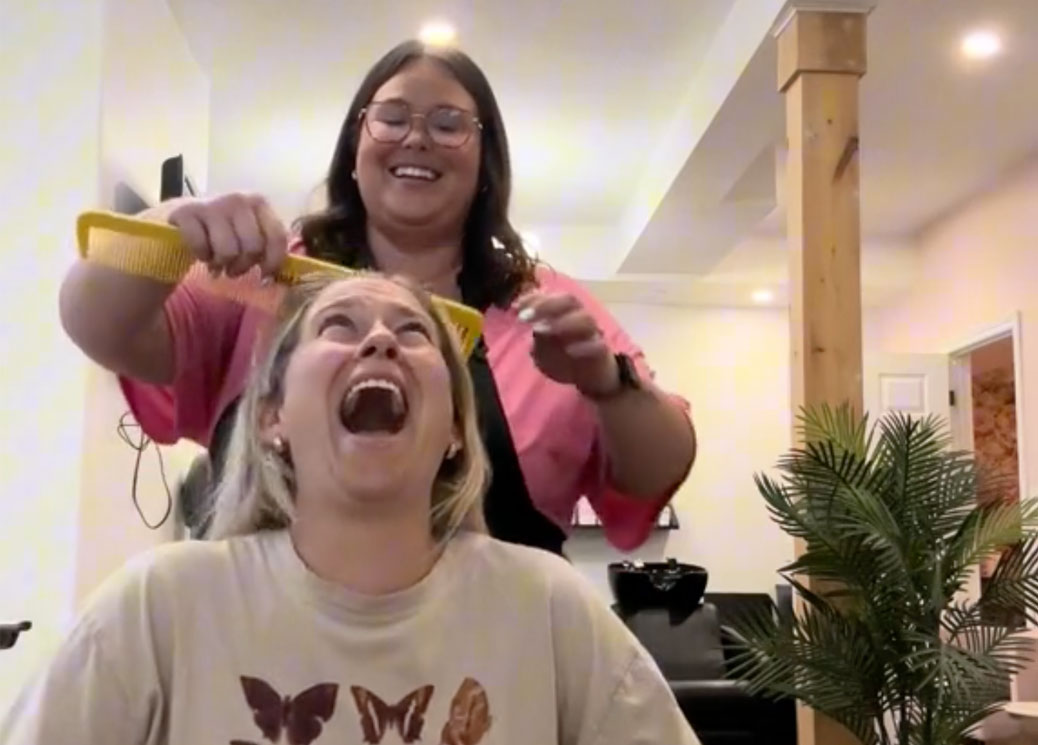Hairdresser secretly records her client's hilarious reactions to her giant comb