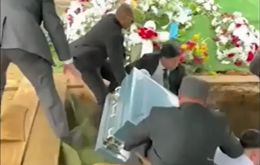 Tragic Burial Turns Chaotic As Pallbearers Fall Into Grave In Shocking Tragic burial turns chaotic as pallbearers fall into grave in shocking