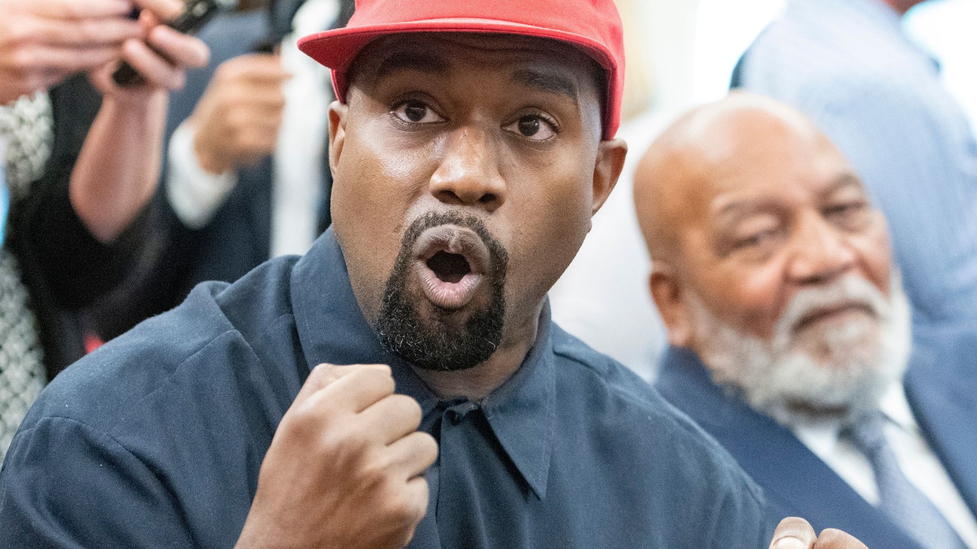 Kanye and Nearly-Naked Wife Hit Market as Former Employee Sues [WATCH]